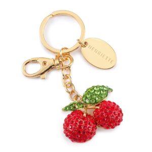 Il Portachiavi Lucky Charme di Henriette è l'accessorio che non può mancare. In metallo brillante, è il perfetto mix di stile e positività. Scegli il tuo preferito e rendi uniche le tue chiavi o la tua borsa! Packaging regalo incluso."